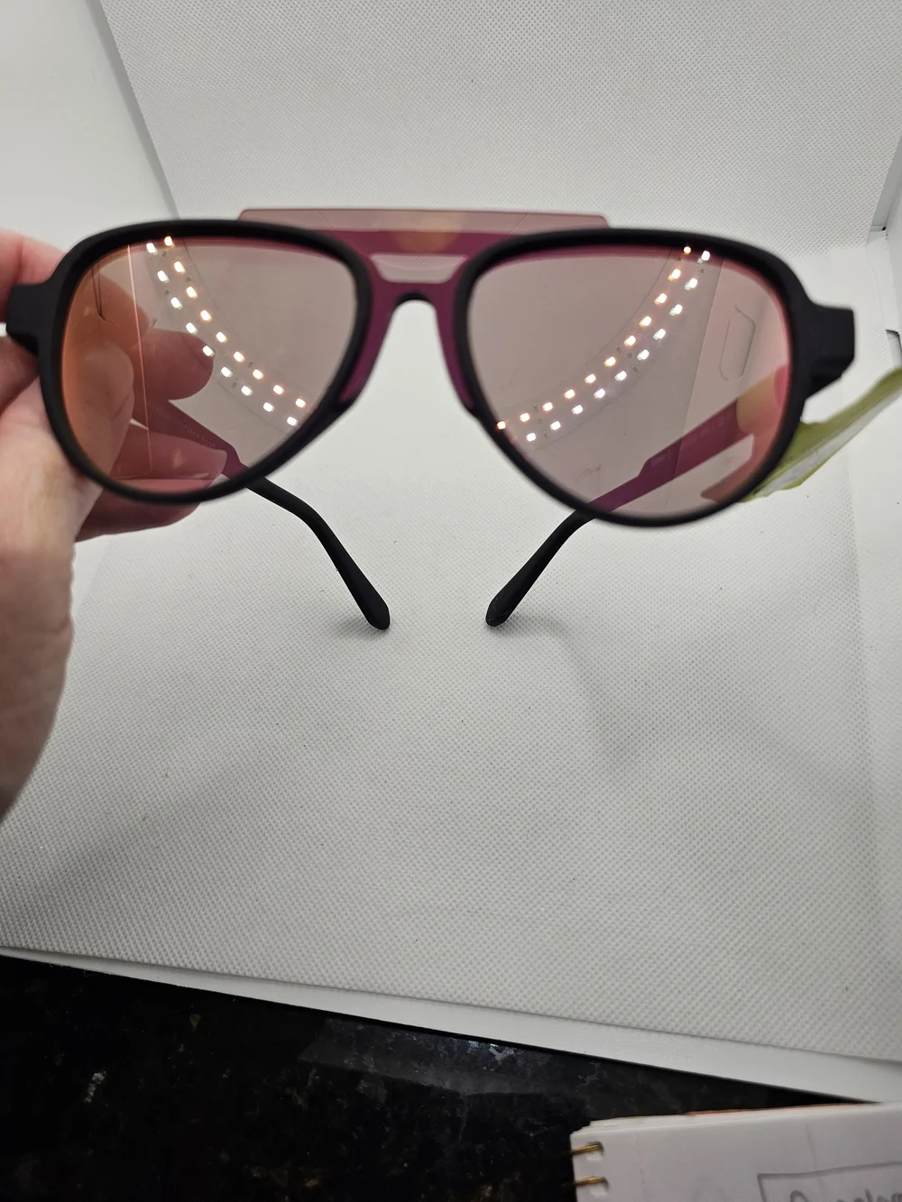 All in Motion Black Frame Sunglasses with Pink Rose-Gold Mirrored Lenses